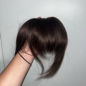 human hair clip in bangs